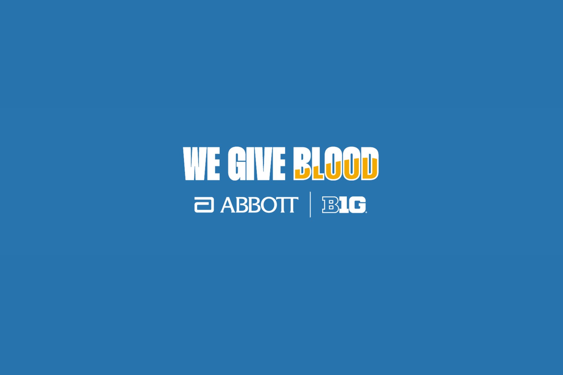 Announcement of We Give Blood Drive with a backdrop of football stadium filled with UCLA fans